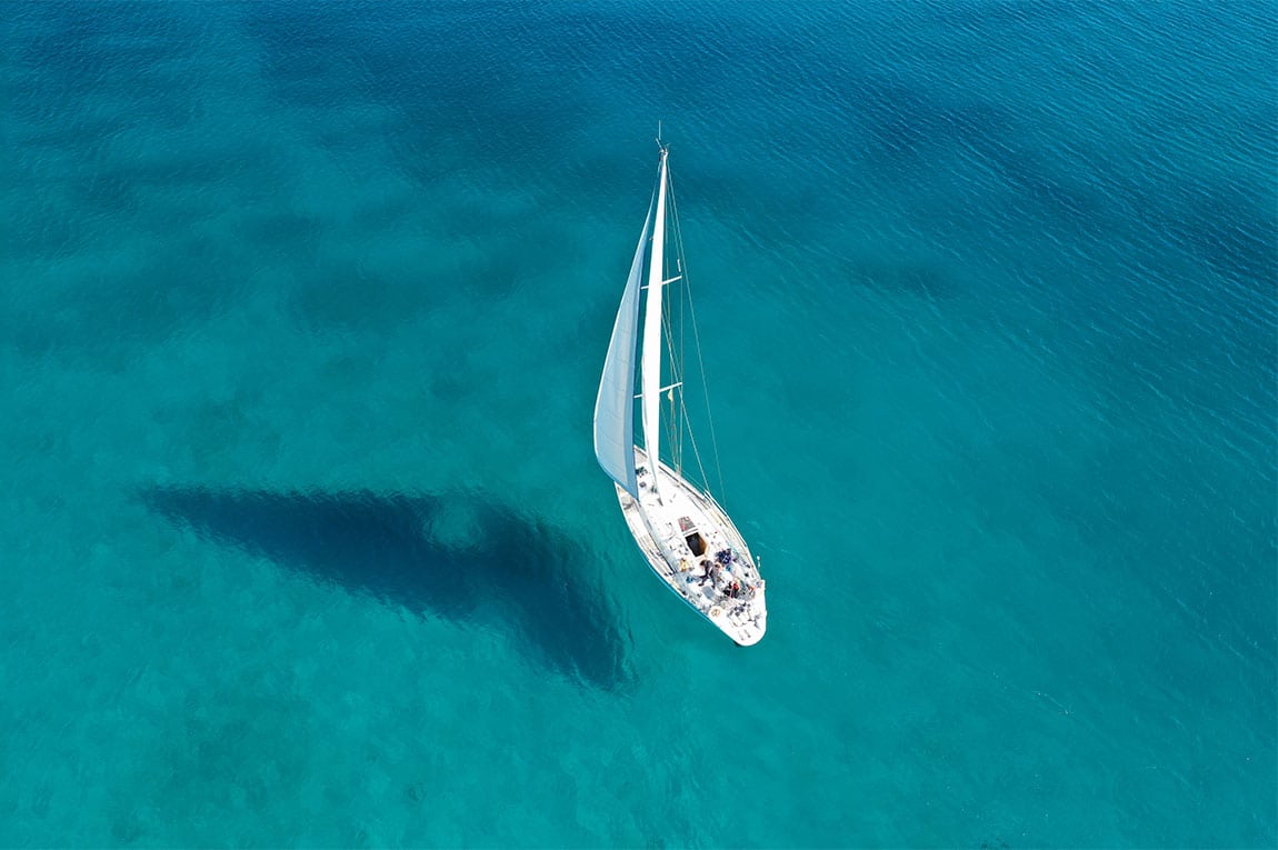 Aerial drone ultra wide photo of beautiful sail boat