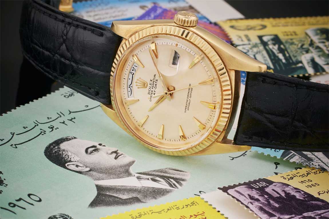 THIS ARABIC-LANGUAGE VINTAGE ROLEX DAY-DATE WATCH WAS A GIFT FROM ANWAR EL SADAT TO GAMAL ABDEL NASSER DURING THE LATTER’S PRESIDENCY OF EGYPT. ESTIMATE: $30,000-60,000